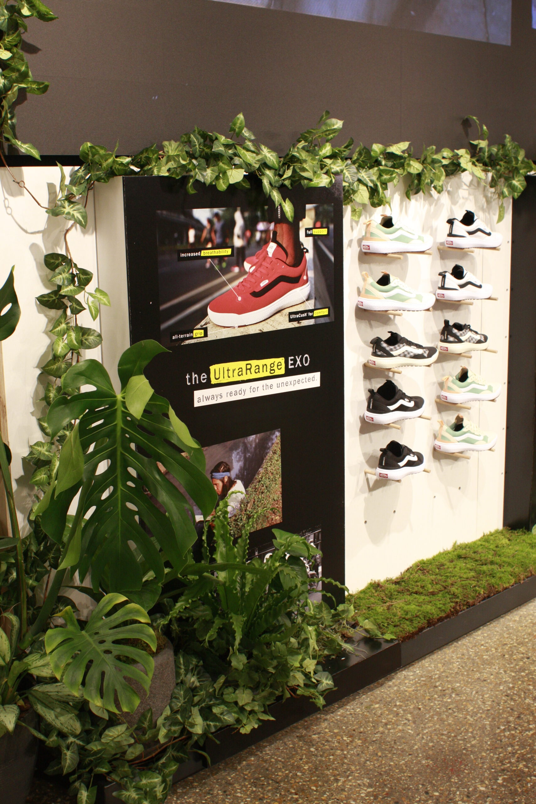 plants installed on shop floor display next to trainers
