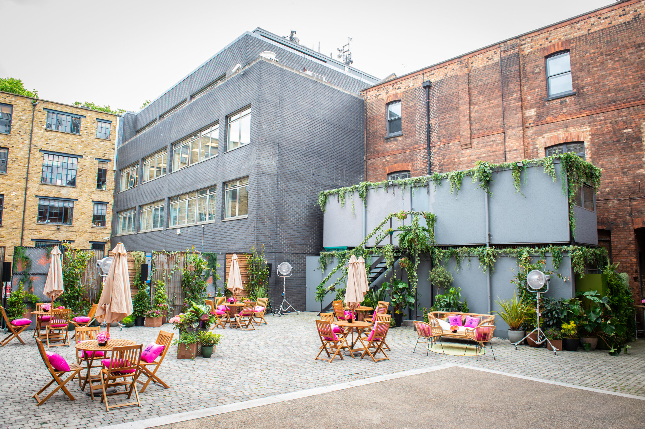 An industrial courtyard with event planting